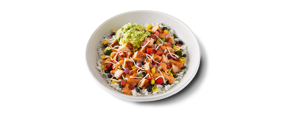A QDOBA bowl with chicken, rice, beans, corn salsa and guacamole